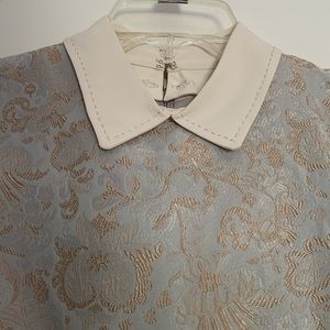 Grey dress with gold embroidered flowers